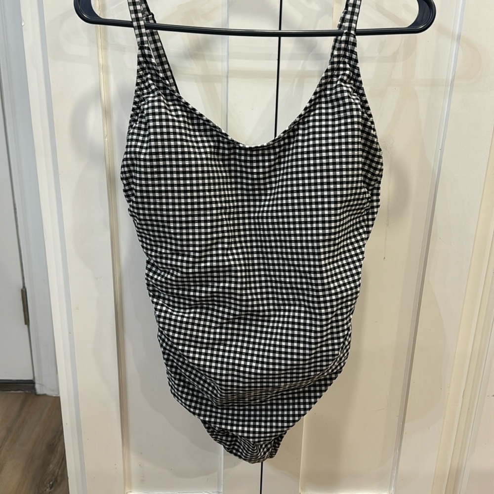 Women’s large 12/14 one piece swim suit.